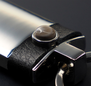 Logotrade meene foto: Triibuline tulekivi võtmerõngas 1292095