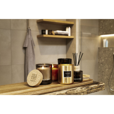 Logotrade reklaamkingituse foto: Woooshi lõhnaküünla rohelised ürdid